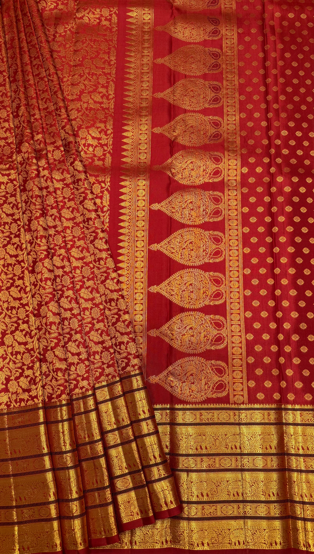 Bright Rust Kanjeevaram silk Saree with Vanam Singaram and (Varisapet / Meena) Border