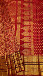 Bright Rust Kanjeevaram silk Saree with Vanam Singaram and (Varisapet / Meena) Border