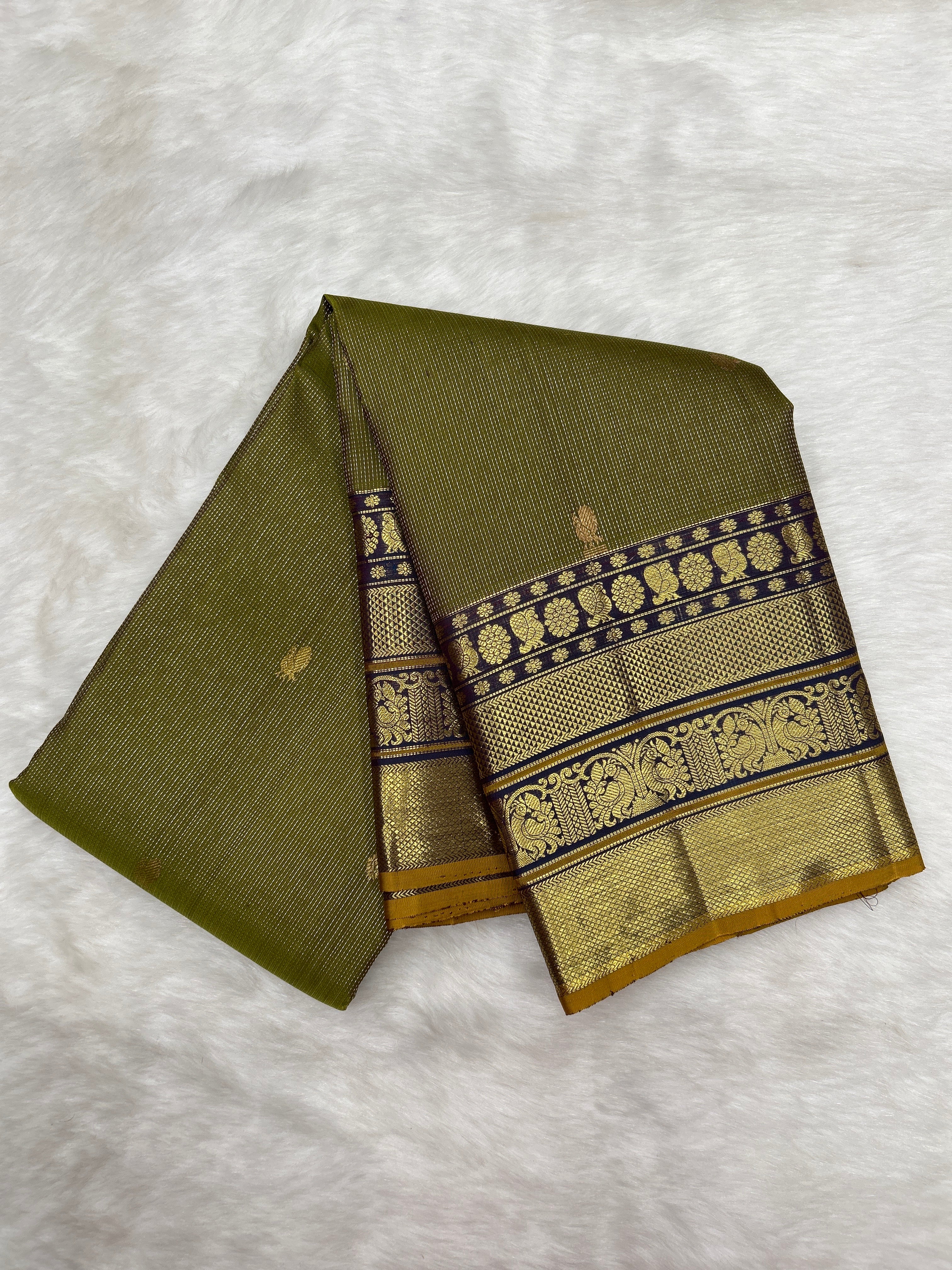 Olive Green Vintage Kanjeevaram saree with Nakshatra body and (Varisapet / Meena) Border