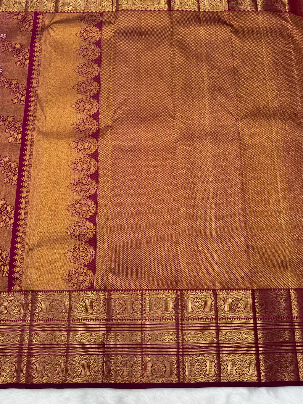 Reddish Maroon Vintage Kanjeevaram Saree with Close Oosi weaveing , Cross Kalanjali Design & Silver Zari Highlighted Flower Motifs