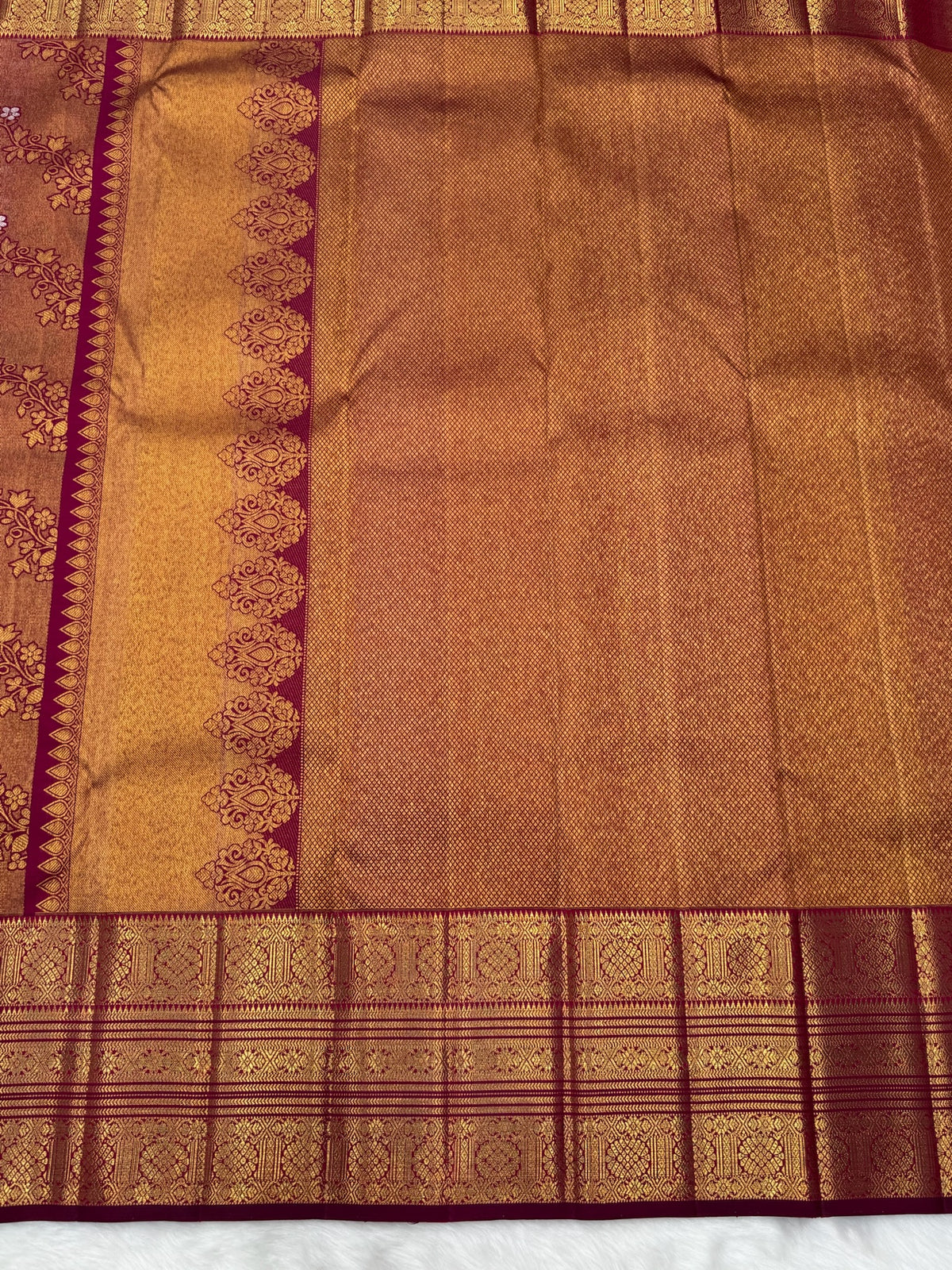 Reddish Maroon Vintage Kanjeevaram Saree with Close Oosi weaveing , Cross Kalanjali Design & Silver Zari Highlighted Flower Motifs