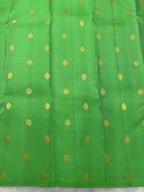 Parrot green borderless Kanjeevaram Saree with contrast Hot Pink pallu & blouse
