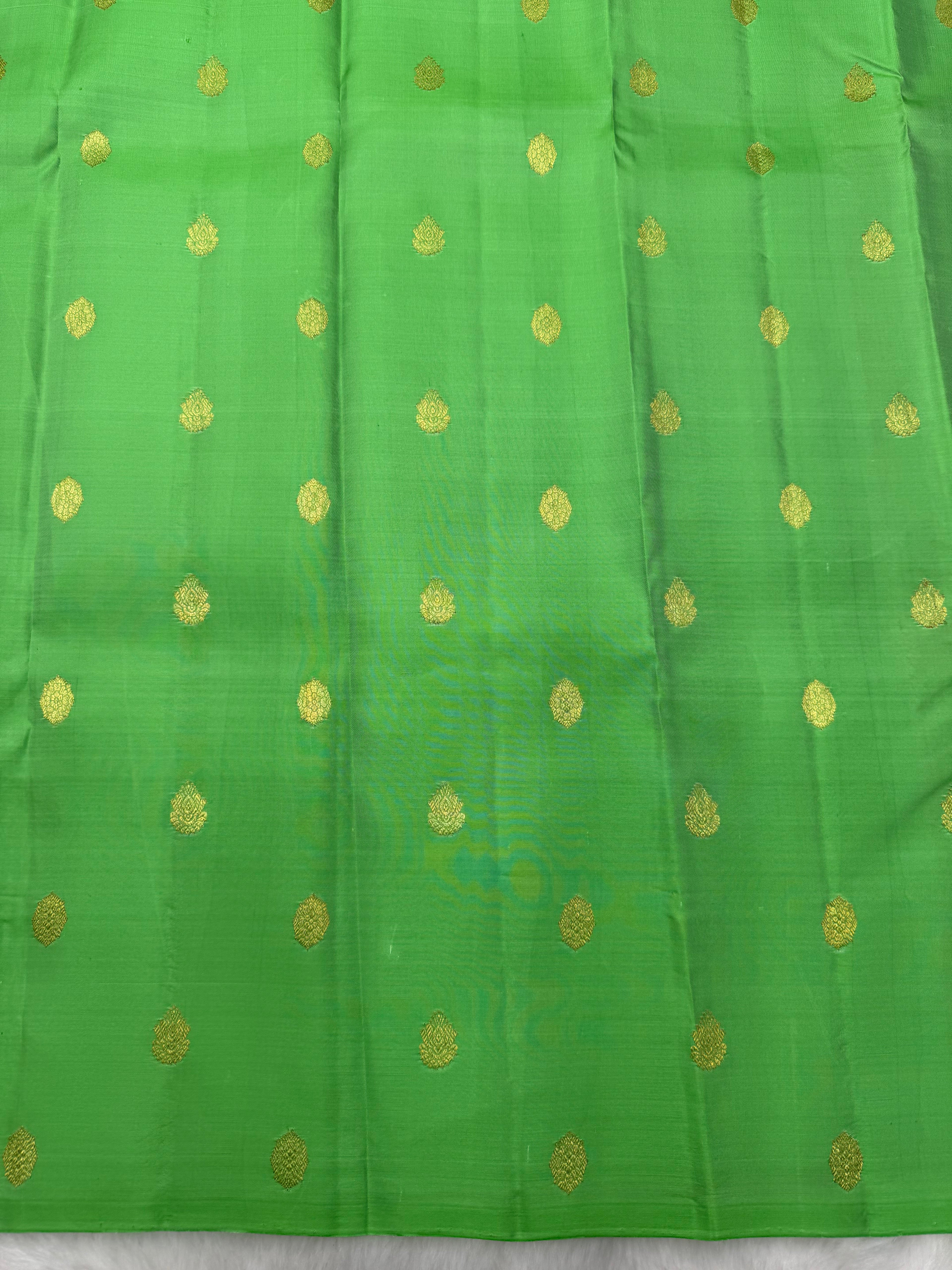 Parrot green borderless Kanjeevaram Saree with contrast Hot Pink pallu & blouse