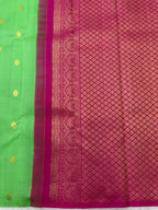 Parrot green borderless Kanjeevaram Saree with contrast Hot Pink pallu & blouse