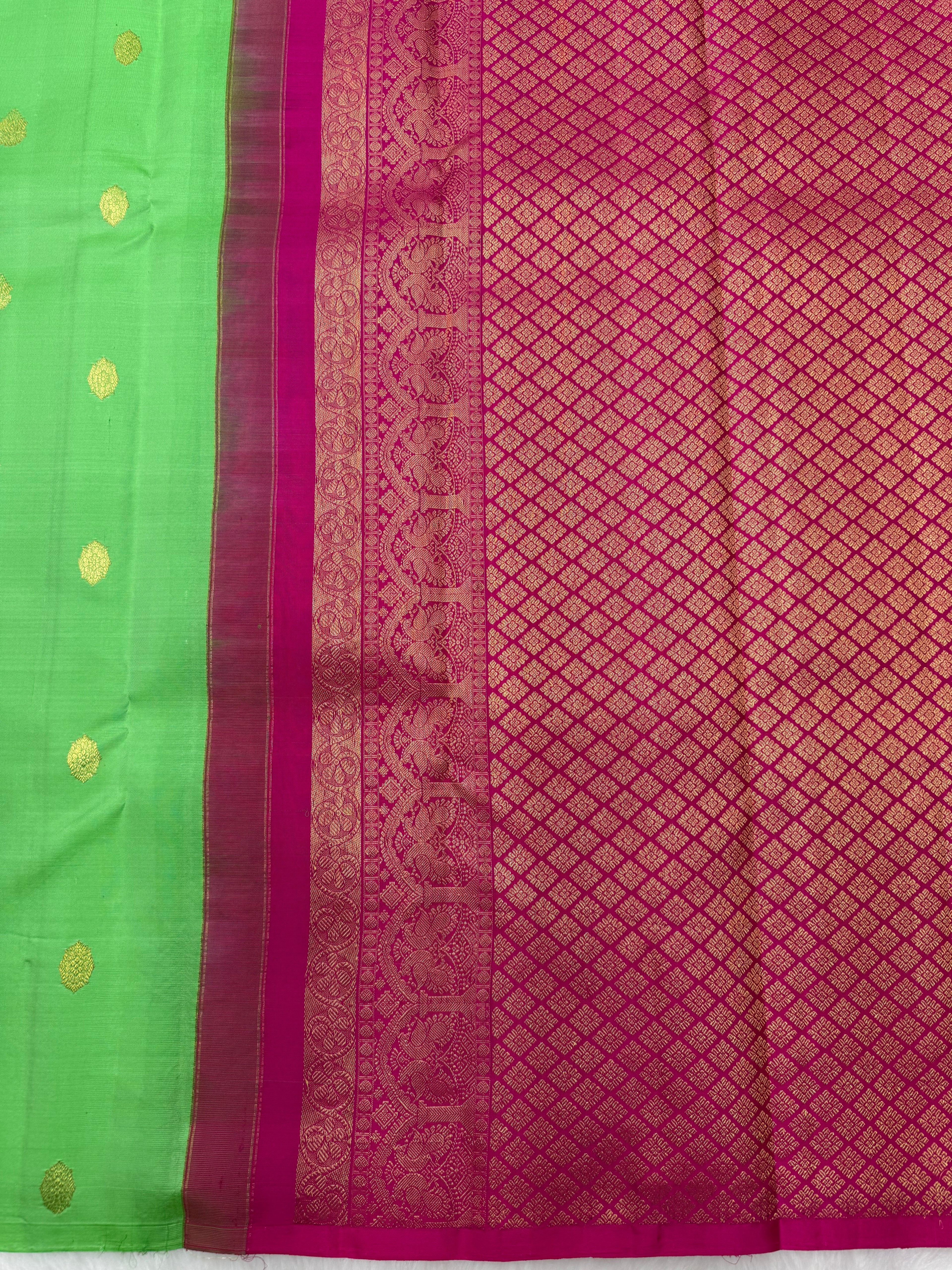 Parrot green borderless Kanjeevaram Saree with contrast Hot Pink pallu & blouse