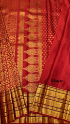Bright Rust Kanjeevaram silk Saree with Vanam Singaram and (Varisapet / Meena) Border