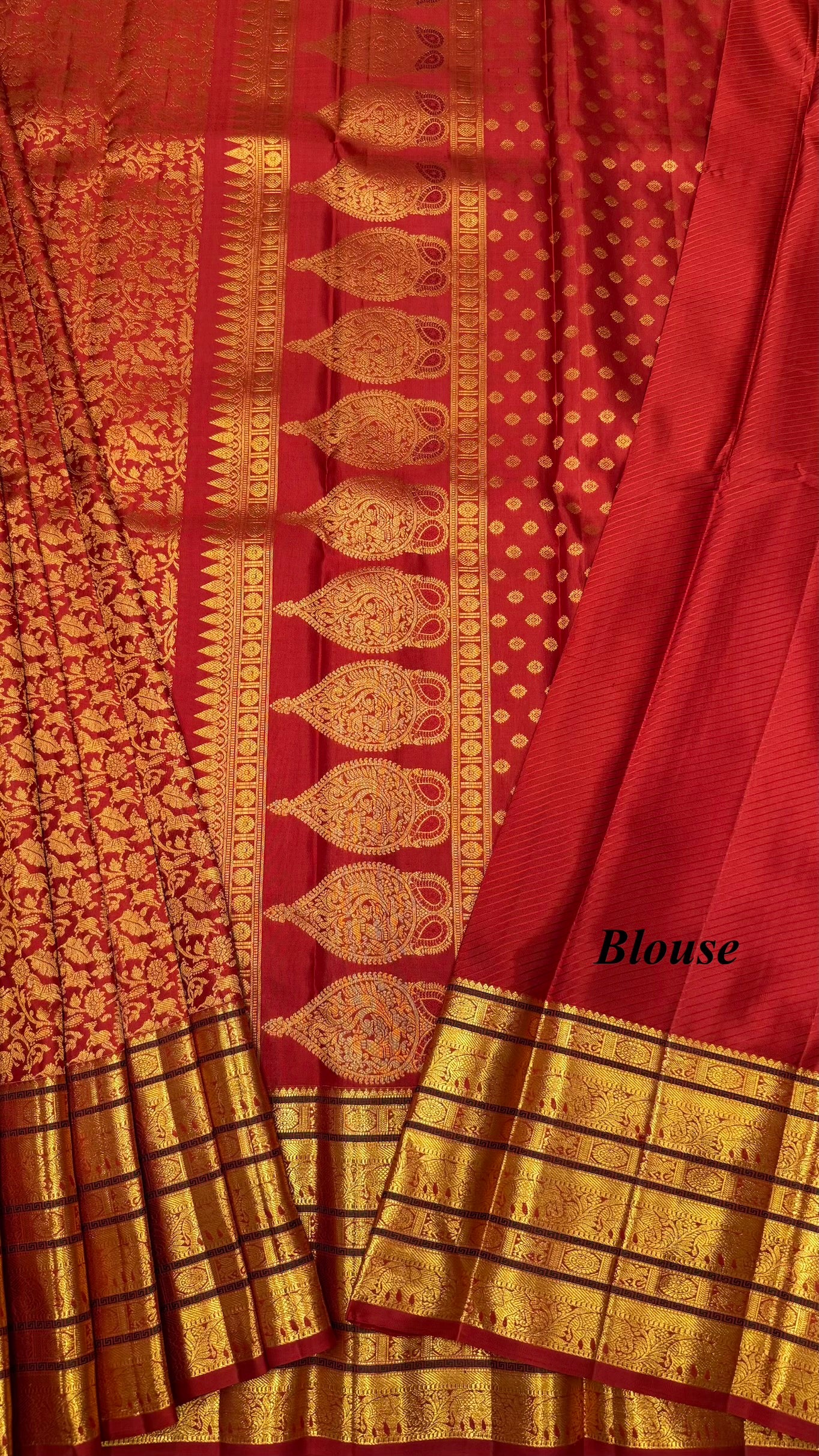 Bright Rust Kanjeevaram silk Saree with Vanam Singaram and (Varisapet / Meena) Border
