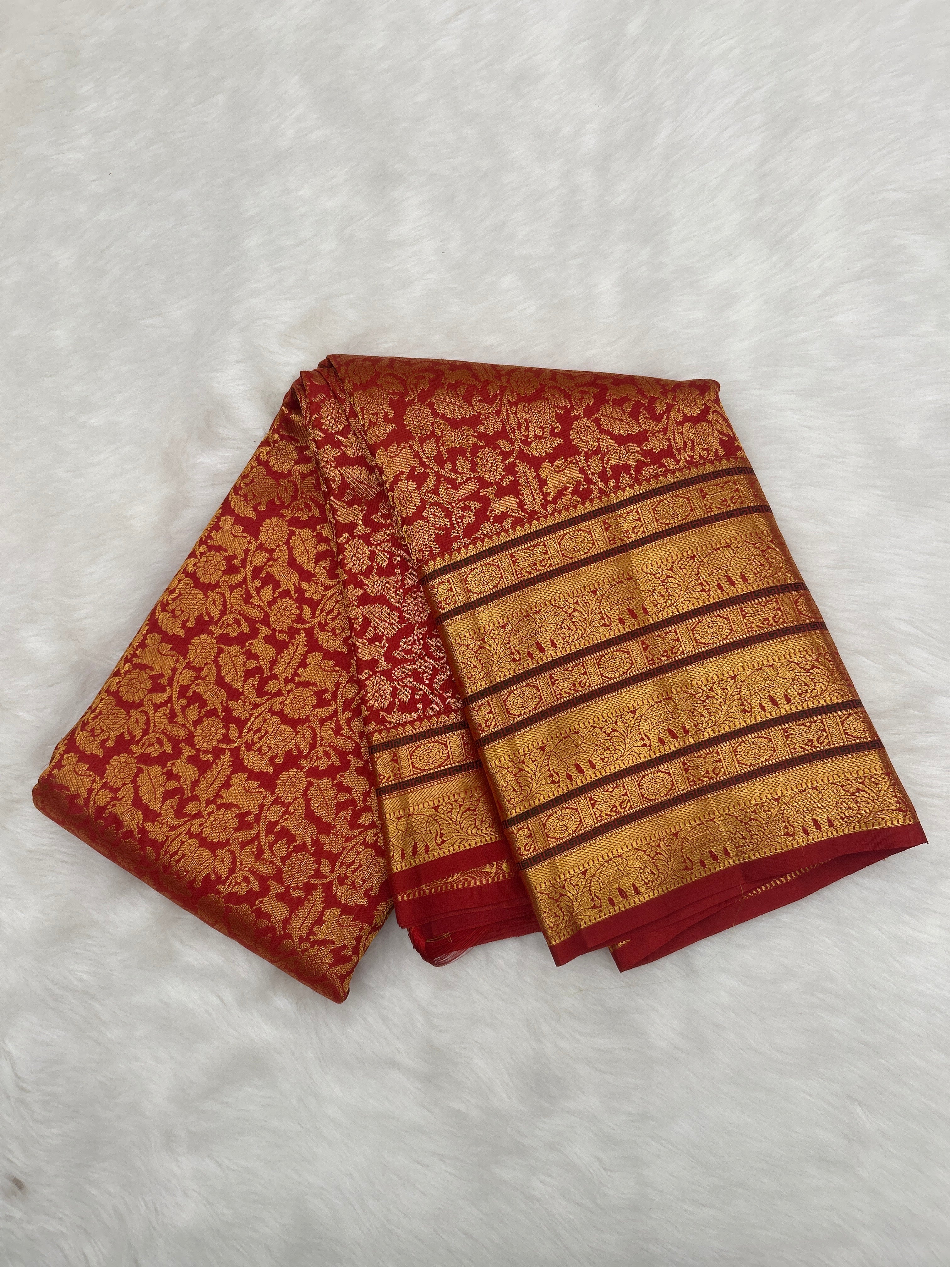 Bright Rust Kanjeevaram silk Saree with Vanam Singaram and (Varisapet / Meena) Border