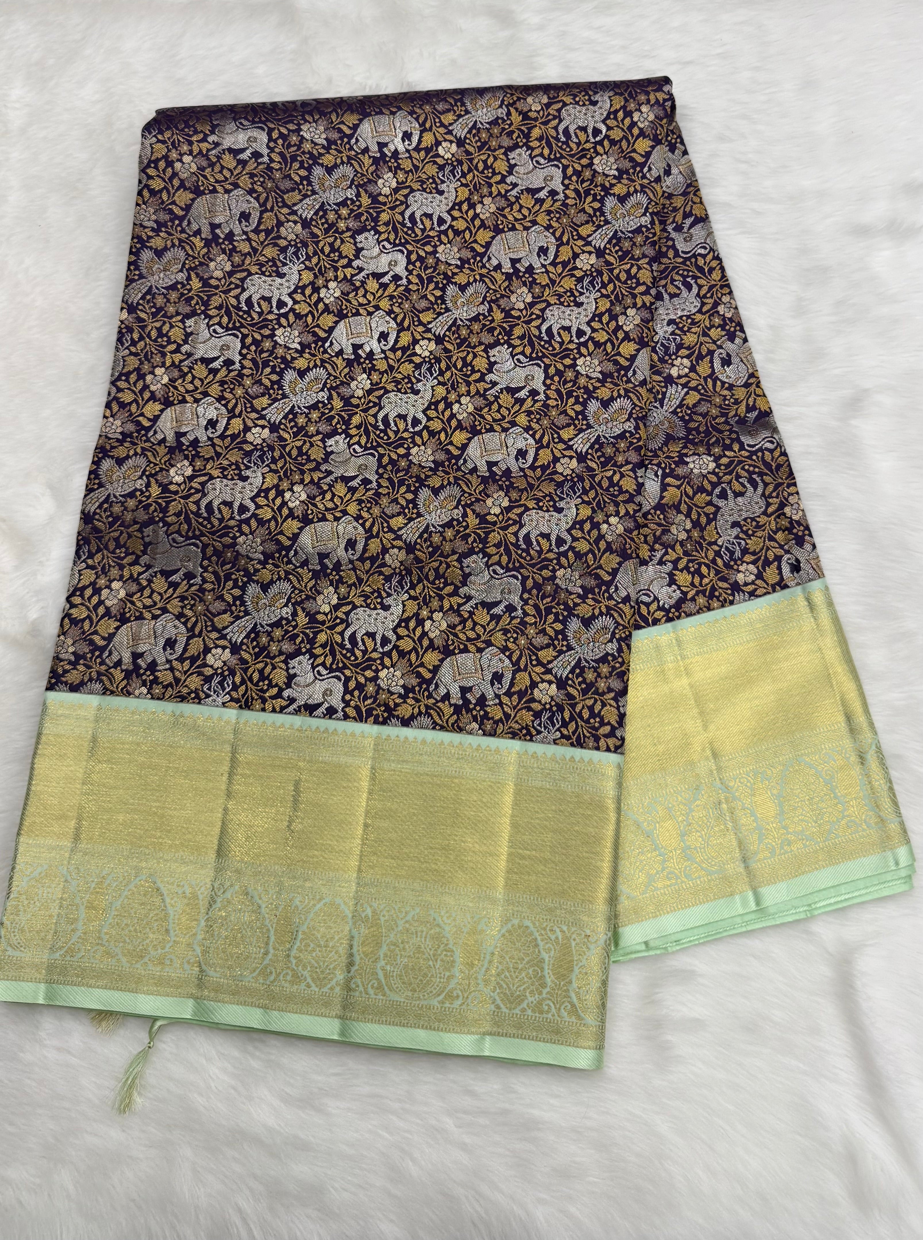 Korvai Kanjeevaram Silk Saree with traditional Vana Singaram