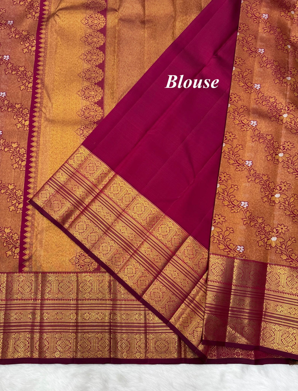 Reddish Maroon Vintage Kanjeevaram Saree with Close Oosi weaveing , Cross Kalanjali Design & Silver Zari Highlighted Flower Motifs
