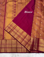 Reddish Maroon Vintage Kanjeevaram Saree with Close Oosi weaveing , Cross Kalanjali Design & Silver Zari Highlighted Flower Motifs