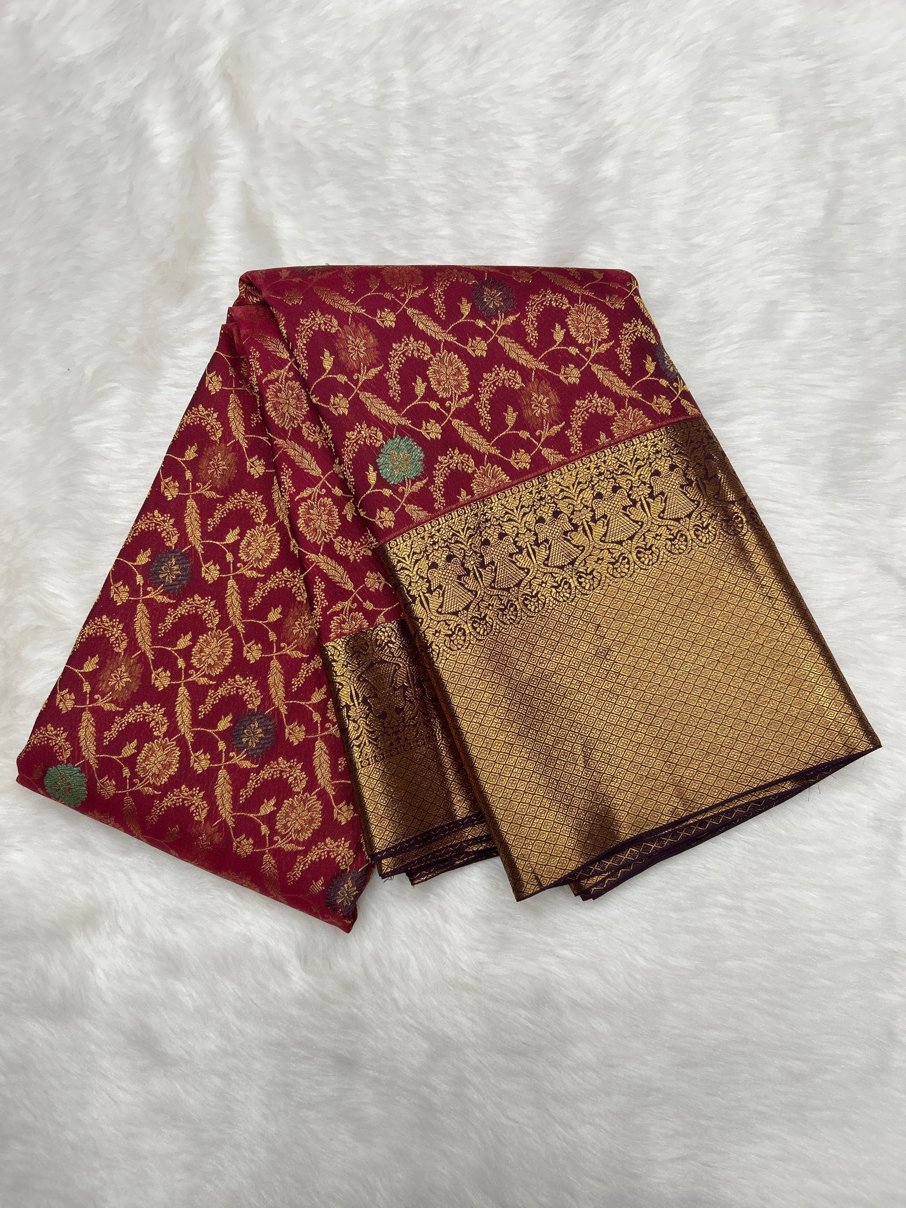 Maroon Kanjeevaram silk saree with Brocade and Meena buttas