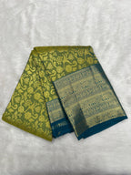 Olive green Brocade Kanjeevaram Silk Saree with a rich Teal border