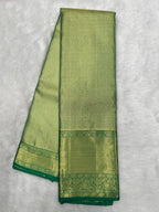 Green Kanjeevaram Tissue Saree with cross-sectional zari lines