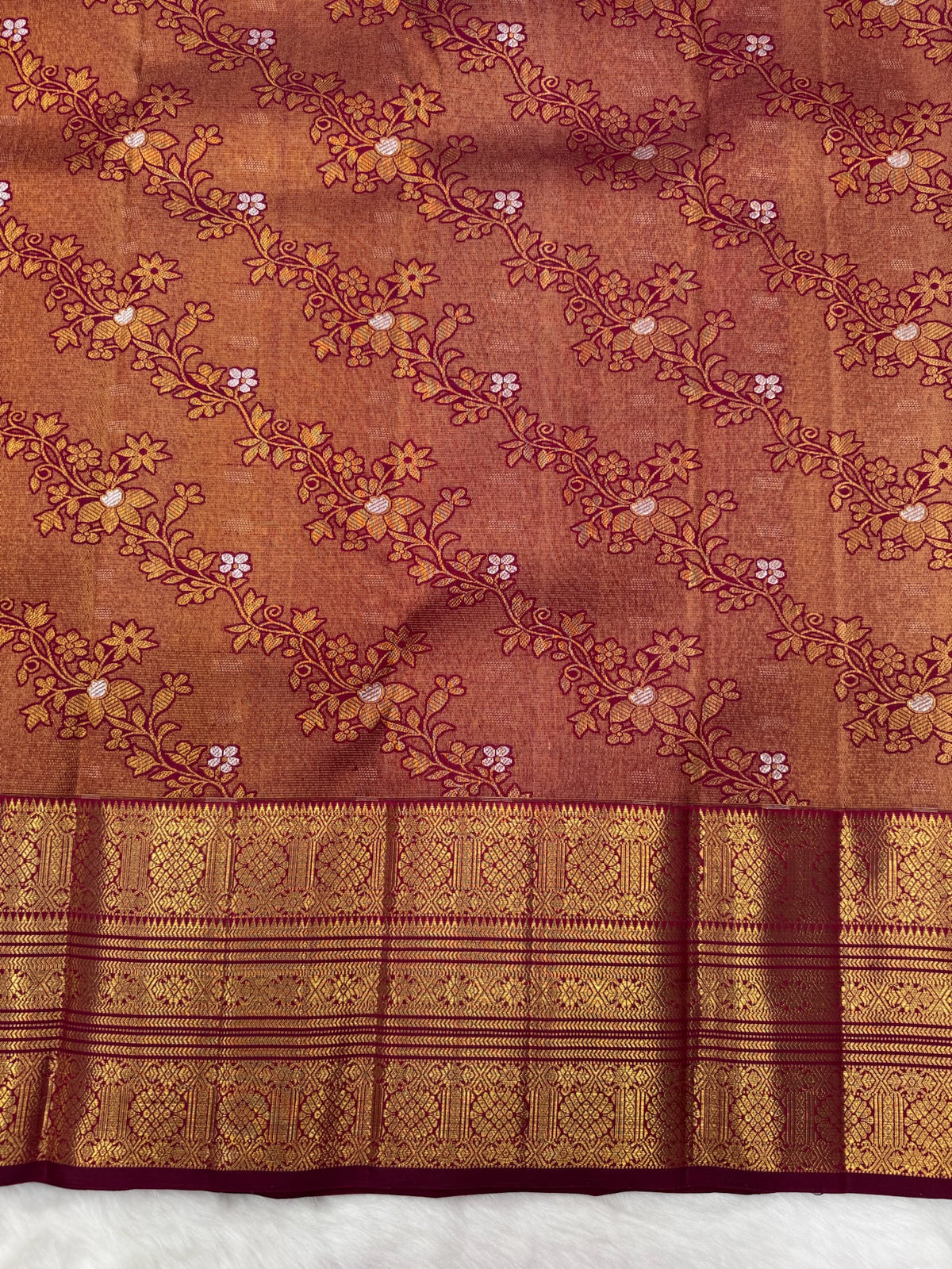 Reddish Maroon Vintage Kanjeevaram Saree with Close Oosi weaveing , Cross Kalanjali Design & Silver Zari Highlighted Flower Motifs