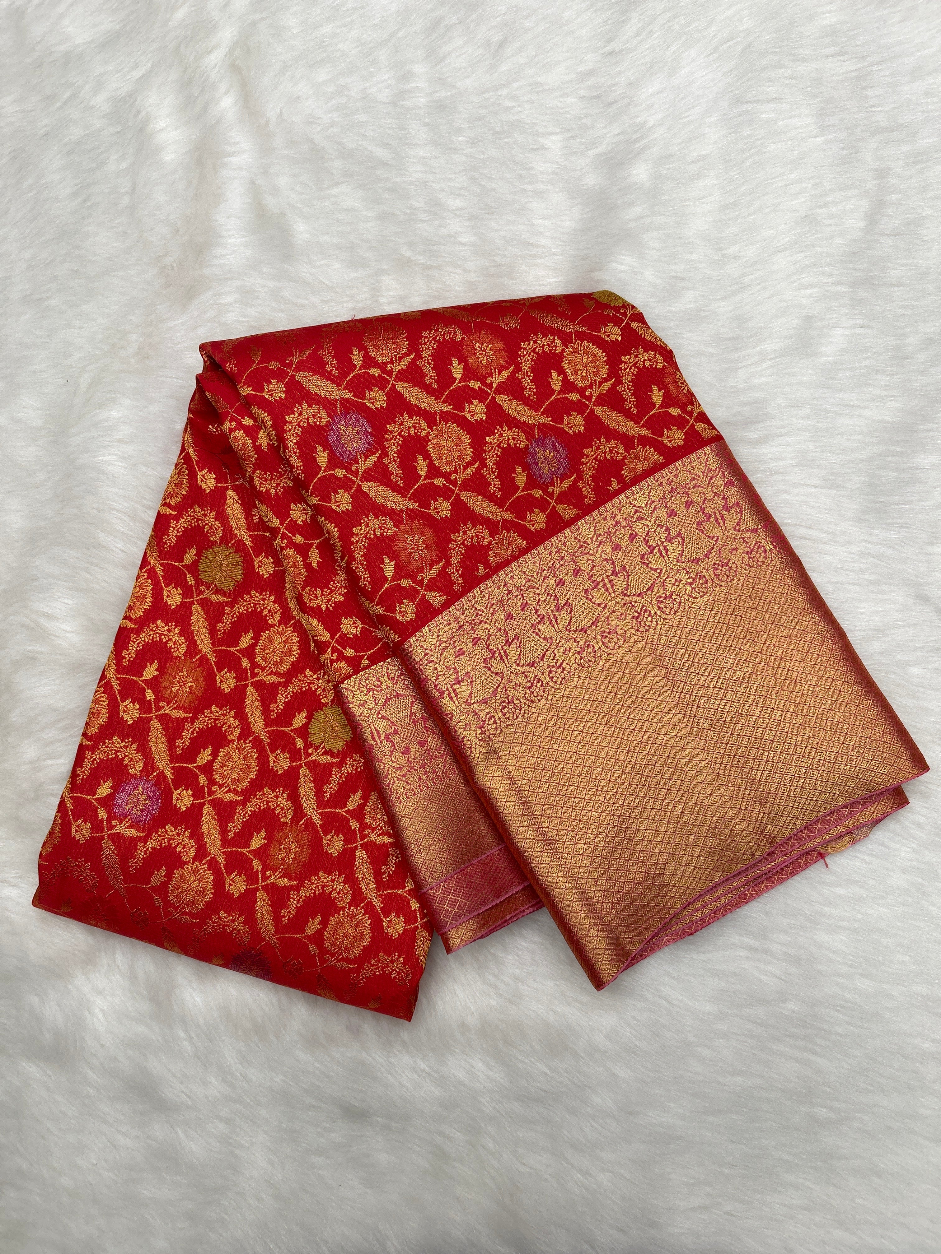 Red Kanjeevaram silk saree with Brocade and Meena buttas