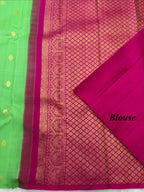 Parrot green borderless Kanjeevaram Saree with contrast Hot Pink pallu & blouse