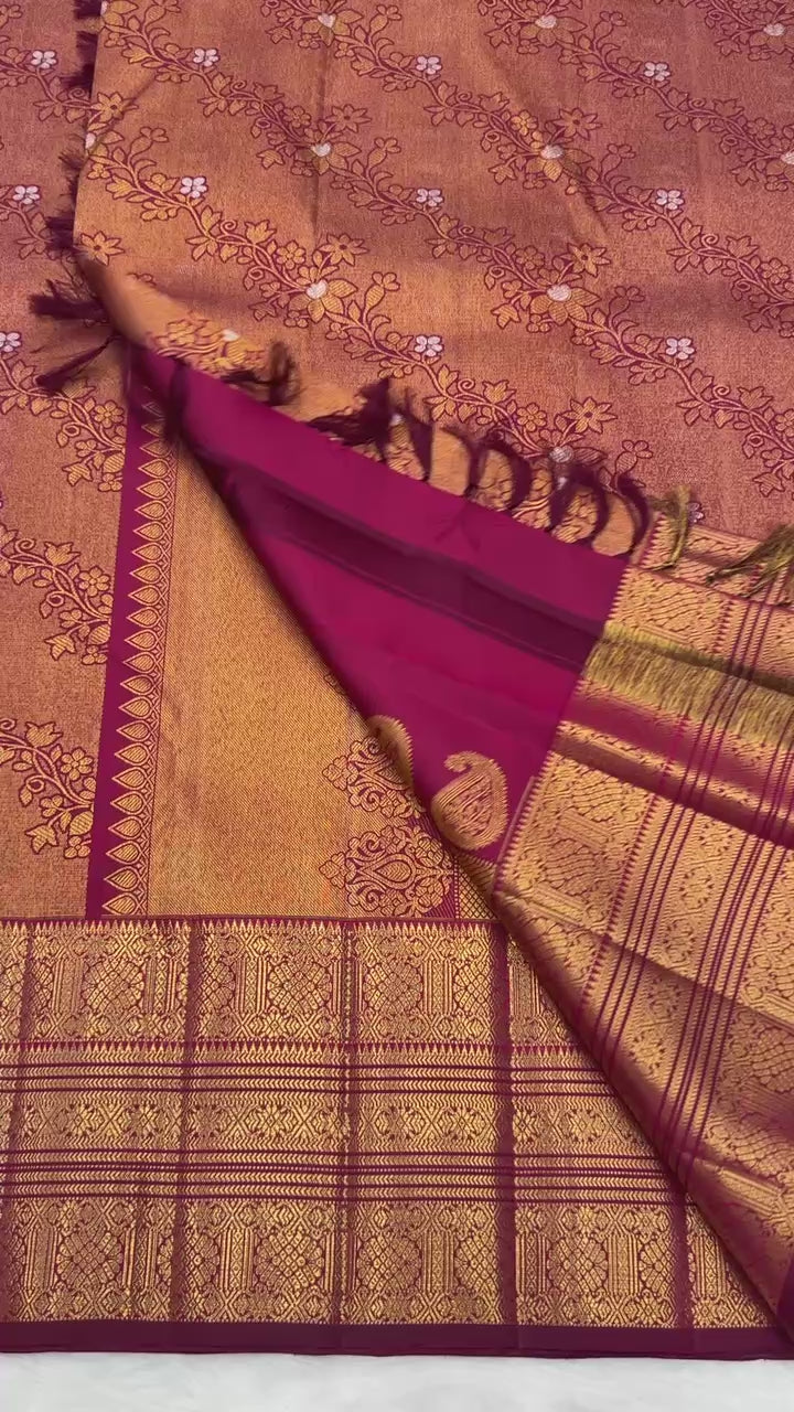 Reddish Maroon Vintage Kanjeevaram Saree with Close Oosi weaveing , Cross Kalanjali Design & Silver Zari Highlighted Flower Motifs